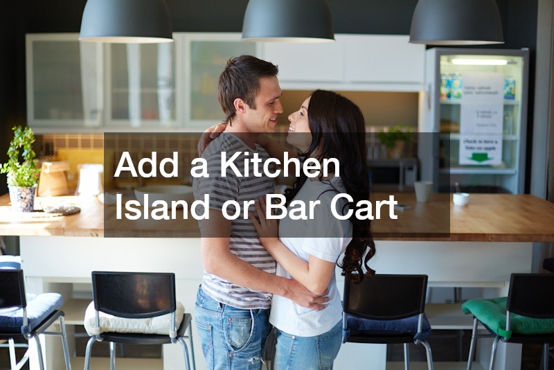 a couple having a good time in their kitchen